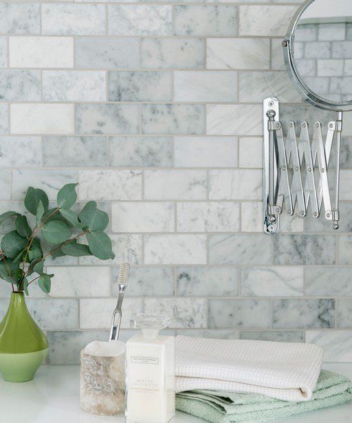 Carrara offers at £9 in Topps Tiles